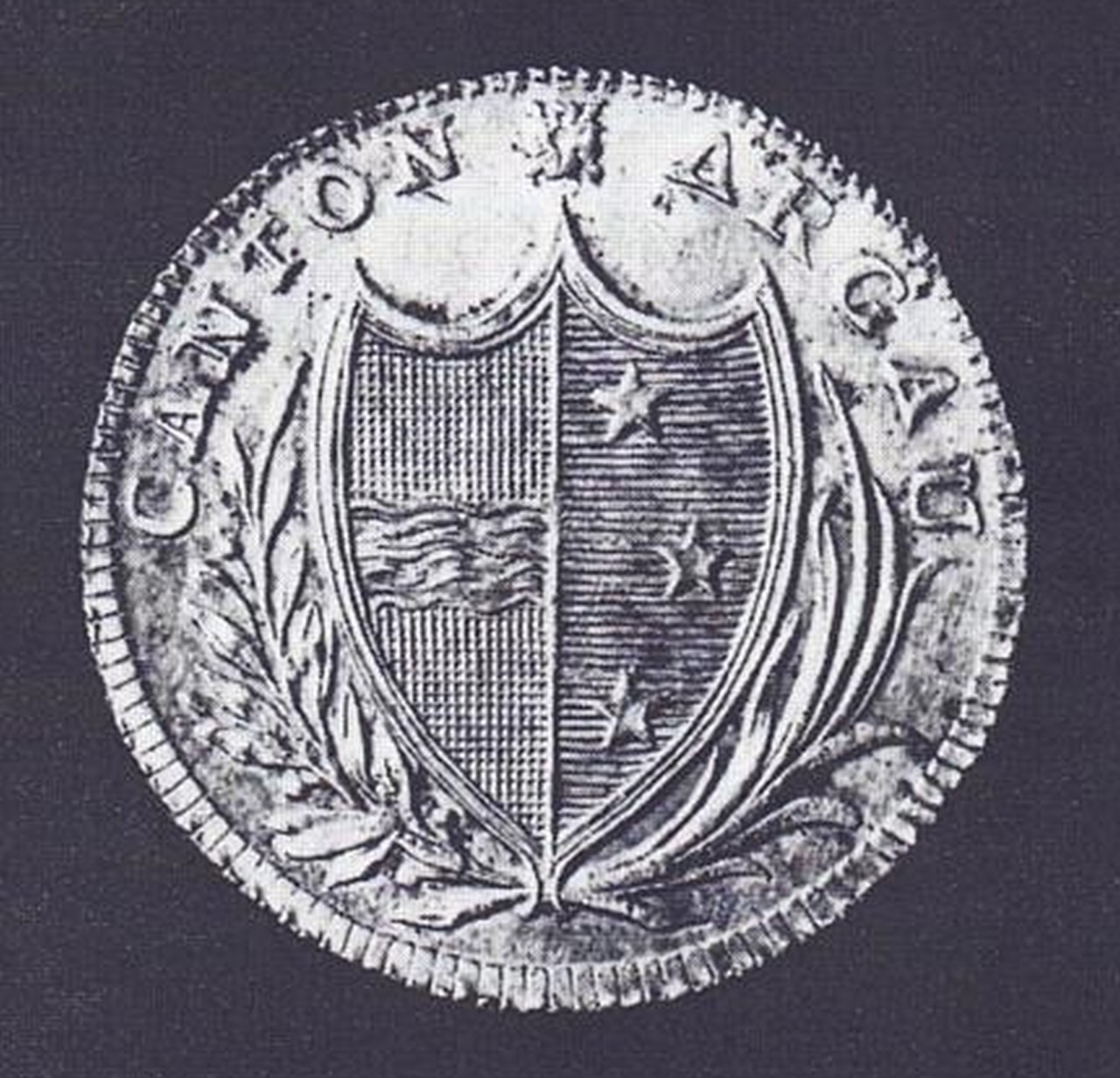 Silberne Münze mit Kantonswappen.