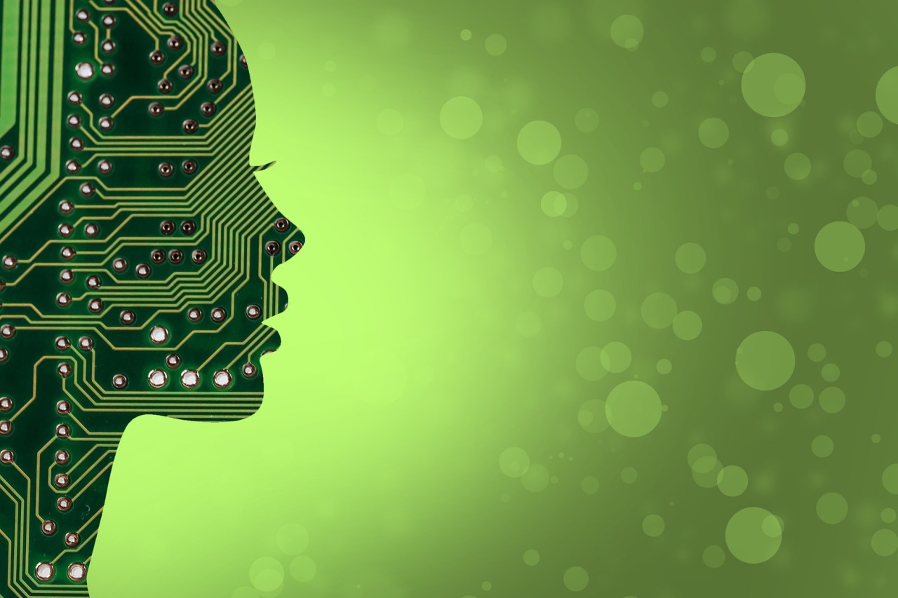 Symbolbild für Roboter und Künstliche Intelligenz mit einem stilisierten Gesicht mit Elektroden