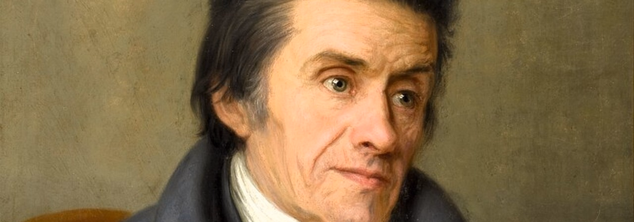 Gemaltes Porträt eines älteren Mannes mit dunklen haaren, weissem Halstuch, schwarzem Sakko und grauem Mantel auf einem Stuhl.