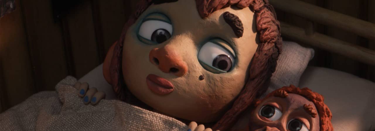 Ausschnitt aus einem Animationsfilm. Ein Kind und ein Affenbaby liegen im Bett unter einer Decke.