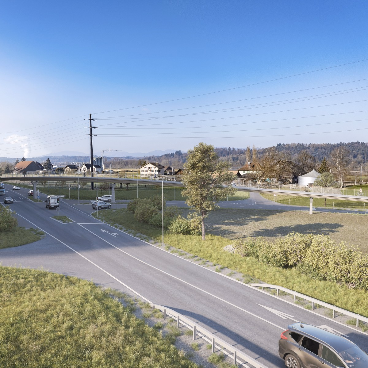 Grünstreifen entlang der Neuen Kantonsstrasse NK240, im Hintergrund die neue Fuss- und Velobrücke.