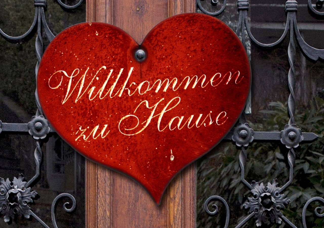 Ein Herz mit der Beschriftung "Willkommen zu Hause".